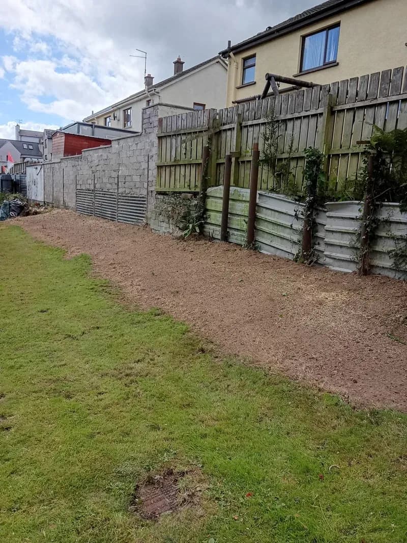 Boundary strip ground out, levelled and left tidy after stump grinding and clearance